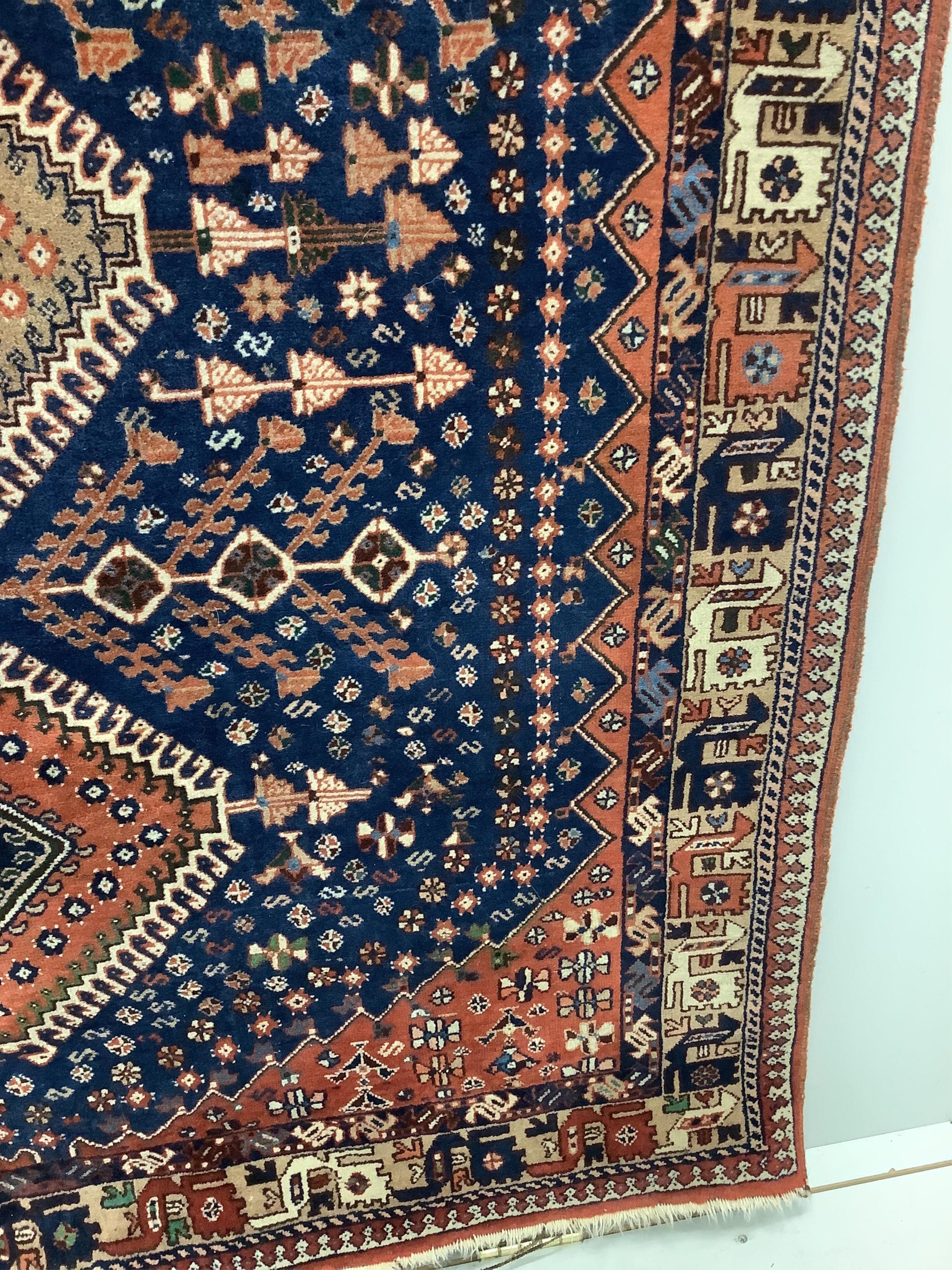 A North West Persian Yalameh blue ground rug, 226 x 151cm. Condition - fair